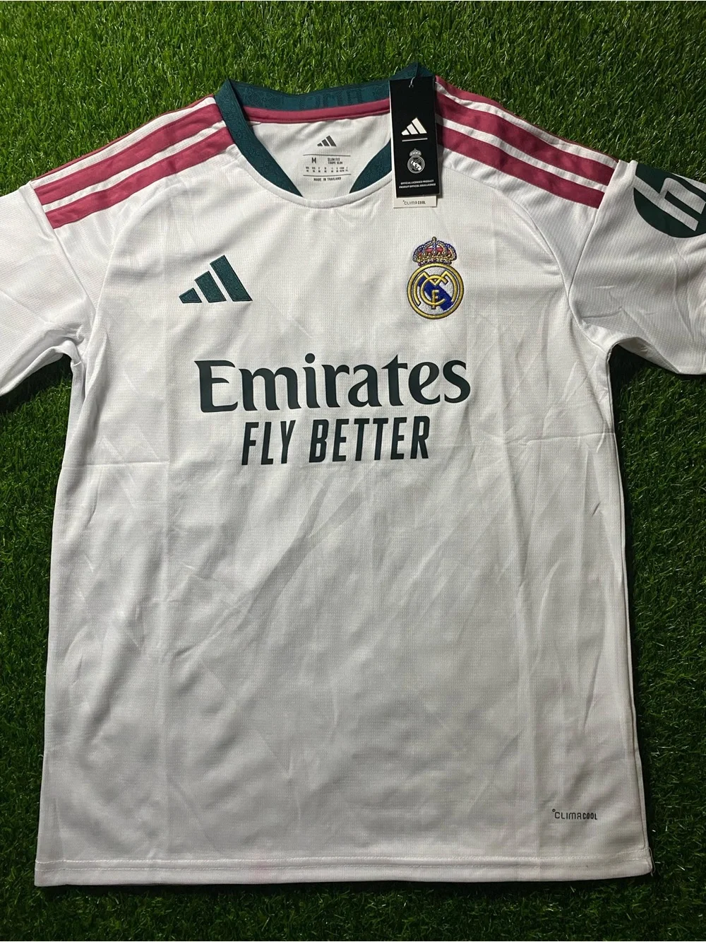 Real Madrid Home Jersey - White with Burgundy and Dark Green Accents